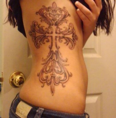 Cross Symbol Rib Tattoo